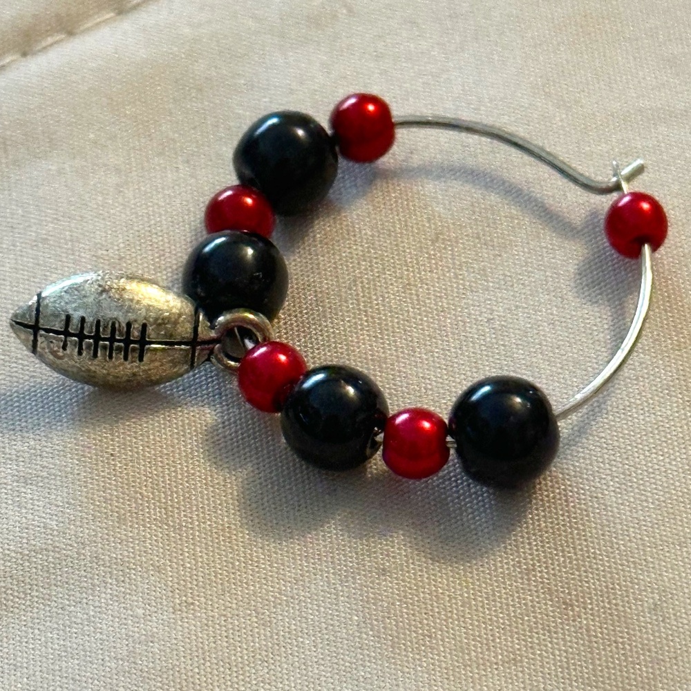Wine glass tag, stainless steel hoop, red/black beads, football charm